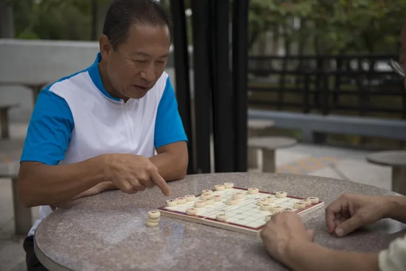 Elderly playing chess