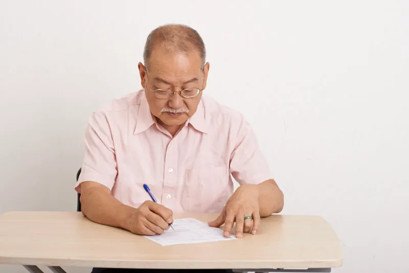 Elderly writing